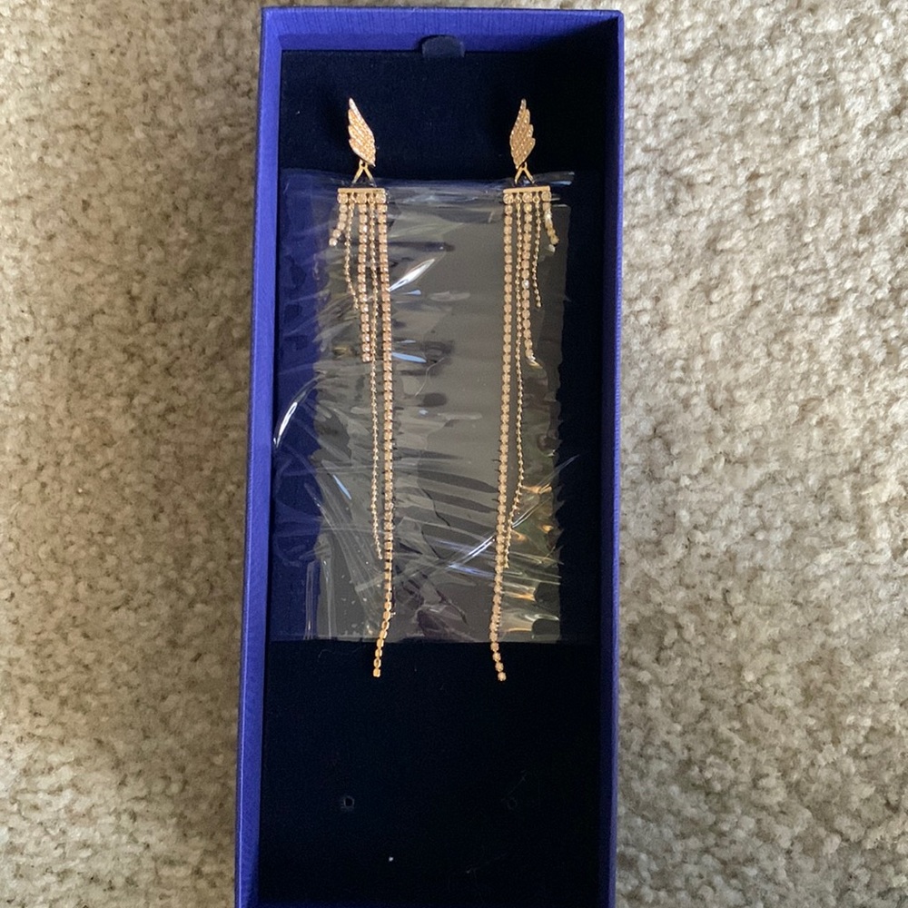 Swarovski Wonder Woman tassel earrings.